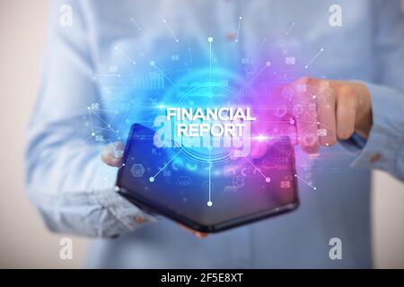 Businessman holding a foldable smartphone, new business concept