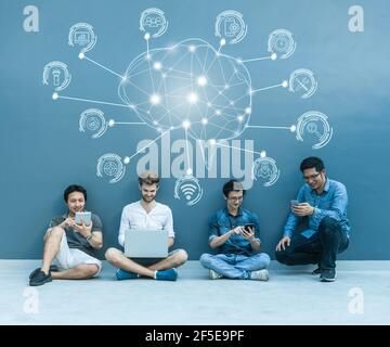 Group Of Asian and Multiethnic Business people using each technology equipment brainstorming for Polygonal brain shape of an artificial intelligence w Stock Photo