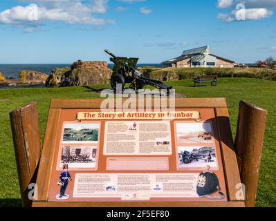 Military history information board by 25-pounder British field artillery gun, Dunbar, East Lothian, Scotland, UK Stock Photo