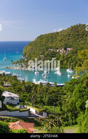 Marigot Bay, Castries, St Lucia. View over the village and harbour to the Caribbean Sea. Stock Photo