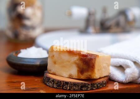 Natural personal care items on a wooden bathroom counter Stock Photo