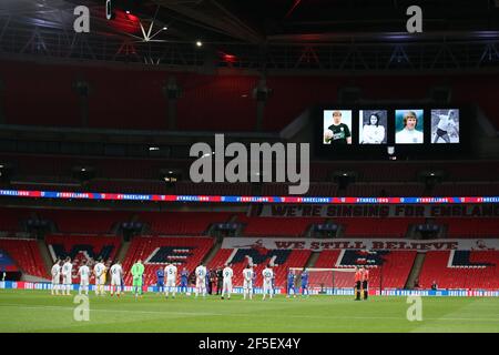 London, UK. 25th Mar, 2021. Players of England and Sam Marino pay respects to footballers who have passed away this year. FIFA World Cup qualifier, group I match, England v San Marino at Wembley Stadium in London on Thursday 25th March 2021. this image may only be used for Editorial purposes. Editorial use only, license required for commercial use. No use in betting, games or a single club/league/player publications. pic by Andrew Orchard/Andrew Orchard sports photography/Alamy Live news Credit: Andrew Orchard sports photography/Alamy Live News Stock Photo