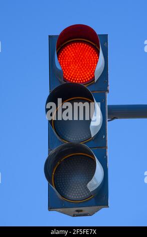 a traffic light shows red light. symbolic photo for maintenance, exit and risk Stock Photo