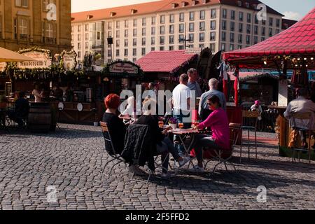 17 May 2019 Dresden, Germany - Biergarten at Altmarkt. People in a beer garden pub. Stock Photo