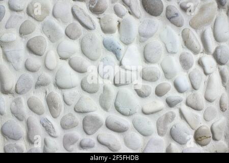 White small stones texture background, cladding tiled bathroom walls Stock Photo