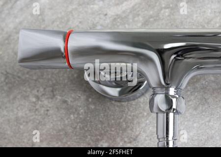 Wall mount shower attachment. Bath shower mixer tap. Detail water tap mixer cold hot water Stock Photo