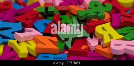 Colorful wooden letters in a close-up Stock Photo