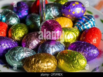 Chocolate eggs in colorful foil for easter Stock Photo