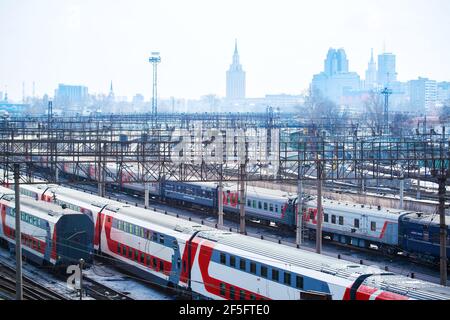 Moscow, Russia - March 26, 2021: Railway carriages in a row stand near the railway station Moskva-Passazhirskaya in the city of Moscow. High quality photo Stock Photo