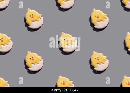 chicken seamless pattern. Yellow biscuit Easter on grey background Stock Photo