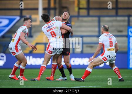 Lee Mossop (8) of Salford Red Devils is tackled by Alex Walmsley (8) of St Helens in, on 3/26/2021. (Photo by Mark Cosgrove/News Images/Sipa USA) Credit: Sipa USA/Alamy Live News Stock Photo