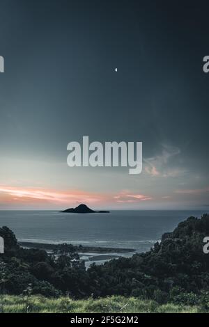 Idyllic sunset view of the Moutohora (Turtle Island) in New Zealand Stock Photo