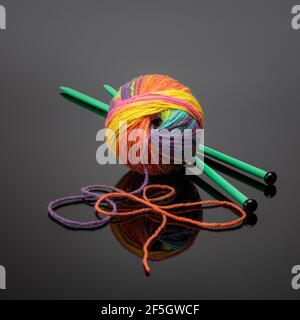 One ball of multi coloured knitting wool Stock Photo