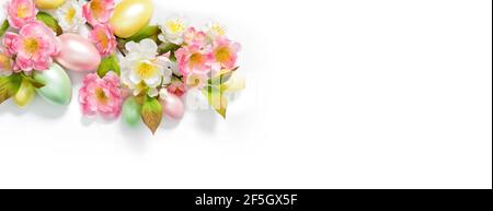 Easter spring banner. Easter eggs and flowers decoration on white background Stock Photo