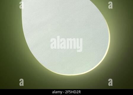 Macro image of green paper with shadow effect and selective focus. Abstract geometric background. Copy space. Stock Photo
