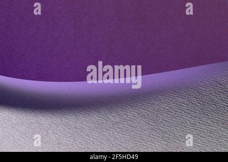 Macro image of purple paper with shadow effect and selective focus. Abstract geometric background. Copy space. Stock Photo