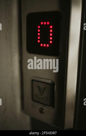 LCD elevator display showing 0 number, automatic system Stock Photo