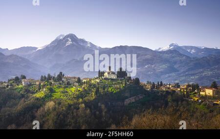 Barga town and Alpi Apuane mountains in winter. Garfagnana, Tuscany, Italy Europe Stock Photo