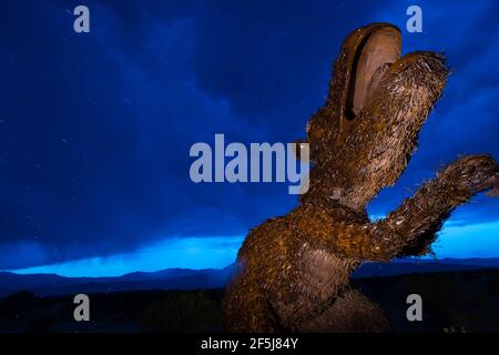 Borrego Springs, CA. March 23, 2021. A sculpture of a dinosaur by Mexican artist Ricardo Breceda captured during a stormy spring afternoon. Stock Photo