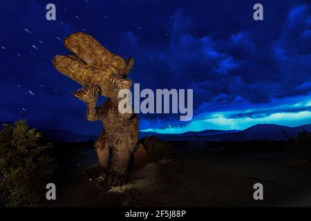 Borrego Springs, CA. March 23, 2021. A sculpture of a dinosaur by Mexican artist Ricardo Breceda captured during a stormy spring afternoon. Stock Photo