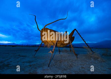 Borrego Springs, CA. March 23, 2021. A sculpture of a locust by Mexican artist Ricardo Breceda during a stormy spring afternoon. Stock Photo