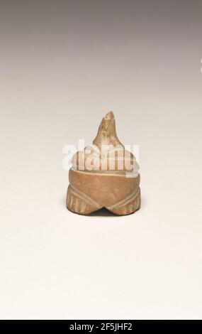 Fragmentary Neolithic Standing Female Figurine. Unknown Stock Photo