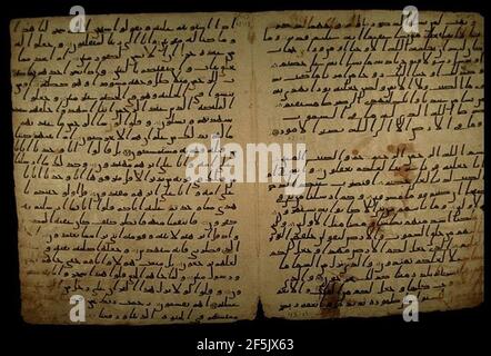 Qur'anic Manuscript - 2 - Hijazi script. Stock Photo