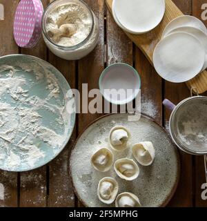 Making Chinese dumplings (wonton). Stock Photo