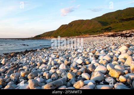 Beach with white round stones, Glenburn, Wairarapa, North Island, New Zealand Stock Photo