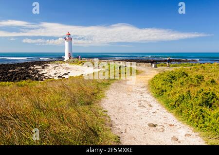 This lighthouse on Griffiths Island was built in 1859 and it is one of the main tourist attractions of the area - Port Fairy, Victoria, Australia Stock Photo