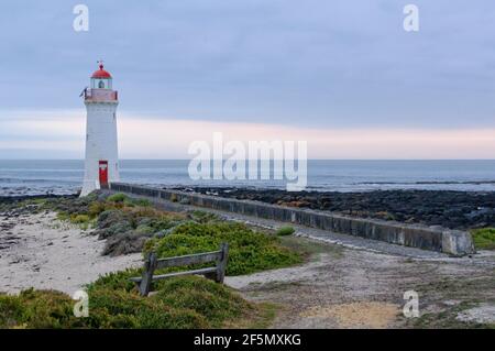 This lighthouse on Griffiths Island was built in 1859 and it is one of the main tourist attractions of the area - Port Fairy, Victoria, Australia Stock Photo