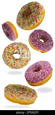 flying donuts isolated on white background. selective focus. set of multicolored crumpets.  Stock Photo