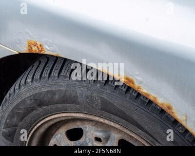 Fender starts rusting on a car Stock Photo
