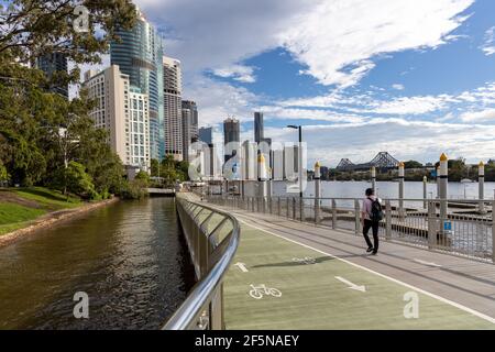 The iconic riverwalk and Brisbane Cityscape along the Brisbane River in Queensland on March 24th 2021 Stock Photo