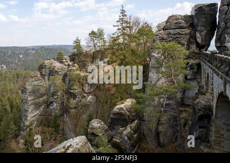 Lohmen, Germany. 26th Mar, 2021. View of the remains of the rock castle Neurathen on the Bastei in Saxon Lohmen near Pirna. The Bastei and the rocky landscapes are among the attractions for tourists from all over the world in the entire Saxon Switzerland. Credit: Daniel Schäfer/dpa-Zentralbild/dpa/Alamy Live News Stock Photo