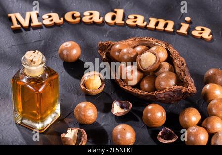 Macadamia integrifolia - Phrase macadamia in wood letters Stock Photo