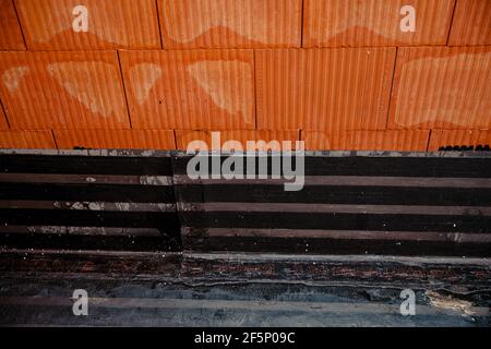 Bituminous vapor barrier mounted on the attic, support layer for synthetic PVC membrane Stock Photo