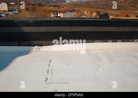 Bituminous vapor barrier mounted on the attic, support layer for synthetic PVC membrane Stock Photo