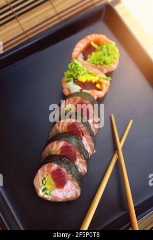 colorful and interesting sushi rolls served in an appetizing way