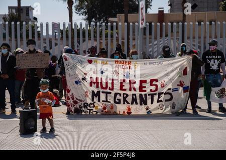 Tijuana, Mexico. 27th Mar, 2021. Asylum seekers demonstrate at the San Ysidro border crossing in Tijuana, Mexico on Friday, March 26, 2021. Many of the them have been sleeping in tents at El Chaparral plaza in hopes of being able to seek asylum in the United States. Photo by Ariana Drehsler/UPI Credit: UPI/Alamy Live News Stock Photo