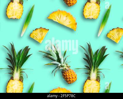 Seamless pattern of ripe pineapple, pineapple halves and slices isolated on green background. Exotic tropical fruit Stock Photo