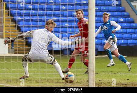 Peterborough United's Sammie Szmodics (right) celebrates scoring their ...