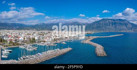 Idyllic landscape flying above Kalamata's Marina at sunset. Aerial photo of Kalamata city, Messenia, Peloponnese, Greece Stock Photo