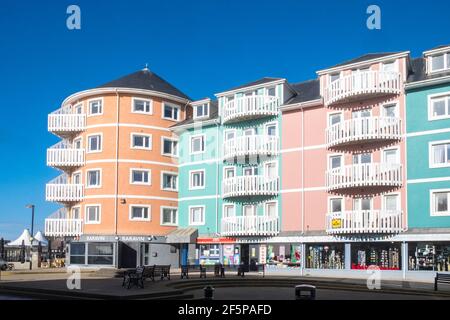 Baravin,cocktail,bar,lounge,and colourful, apartments,on,waterfront,with sea views,in, Aberystwyth,Cardigan Bay,student,university,coast,coastal,town,in,Ceredigion,Mid,West,Wales,Welsh,GB,Great Britain,Britain,British,UK,United Kingdom,Europe,Image taken on Friday March 27th 2021,the last day of lockdown. From 27th March 2021 Welsh residents have been allowed/permitted to travel anywhere within Wales as Stay Local,and prior to that Stay at Home rules have been scrapped.Getting outside,outdoors,has been seen as a good way of improving mental health during lockdown. Stock Photo