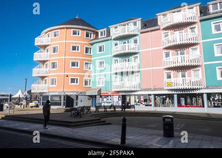 Baravin,cocktail,bar,lounge,and colourful, apartments,on,waterfront,with sea views,in, Aberystwyth,Cardigan Bay,student,university,coast,coastal,town,in,Ceredigion,Mid,West,Wales,Welsh,GB,Great Britain,Britain,British,UK,United Kingdom,Europe,Image taken on Friday March 27th 2021,the last day of lockdown. From 27th March 2021 Welsh residents have been allowed/permitted to travel anywhere within Wales as Stay Local,and prior to that Stay at Home rules have been scrapped.Getting outside,outdoors,has been seen as a good way of improving mental health during lockdown. Stock Photo