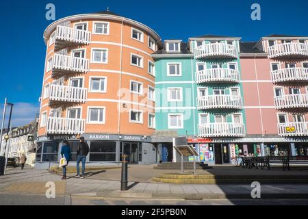 Baravin,cocktail,bar,lounge,and colourful, apartments,on,waterfront,with sea views,in, Aberystwyth,Cardigan Bay,student,university,coast,coastal,town,in,Ceredigion,Mid,West,Wales,Welsh,GB,Great Britain,Britain,British,UK,United Kingdom,Europe,Image taken on Friday March 27th 2021,the last day of lockdown. From 27th March 2021 Welsh residents have been allowed/permitted to travel anywhere within Wales as Stay Local,and prior to that Stay at Home rules have been scrapped.Getting outside,outdoors,has been seen as a good way of improving mental health during lockdown. Stock Photo