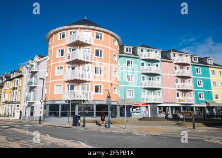 Baravin,cocktail,bar,lounge,and colourful, apartments,on,waterfront,with sea views,in, Aberystwyth,Cardigan Bay,student,university,coast,coastal,town,in,Ceredigion,Mid,West,Wales,Welsh,GB,Great Britain,Britain,British,UK,United Kingdom,Europe,Image taken on Friday March 27th 2021,the last day of lockdown. From 27th March 2021 Welsh residents have been allowed/permitted to travel anywhere within Wales as Stay Local,and prior to that Stay at Home rules have been scrapped.Getting outside,outdoors,has been seen as a good way of improving mental health during lockdown. Stock Photo