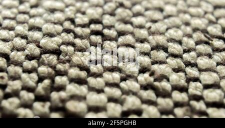 Macro texture of woven wool fabric with neutral tones Stock Photo