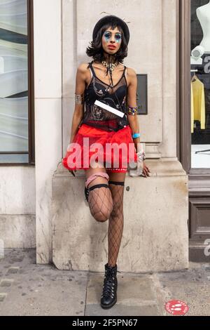 London, UK. 27th Mar, 2021. A model showcases Pierre Garroudi's latest colorful collection during the Lockdown flashmob fashion show around London's West End. (Photo by Phil Lewis/SOPA Images/Sipa USA) Credit: Sipa USA/Alamy Live News Stock Photo