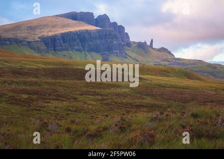 Dramatic sunrise or sunset view of the prehistoric Scottish Highlands landscape of the rock pinnacle Old Man of Storr on the Isle of Skye, Scotland. Stock Photo